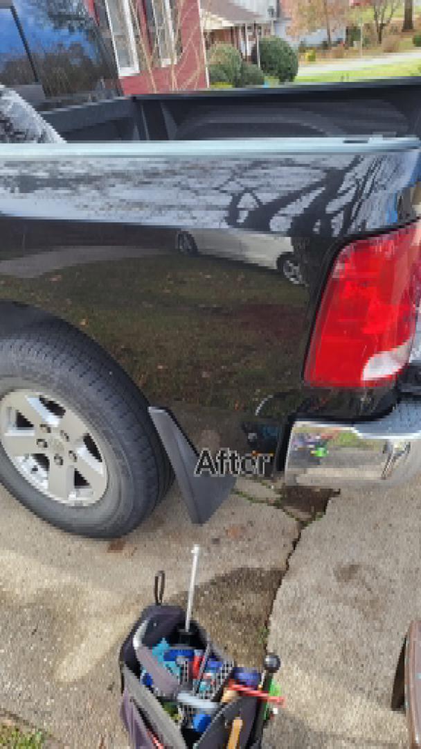 After: truck bed dent repaired with PDR, no repainting needed