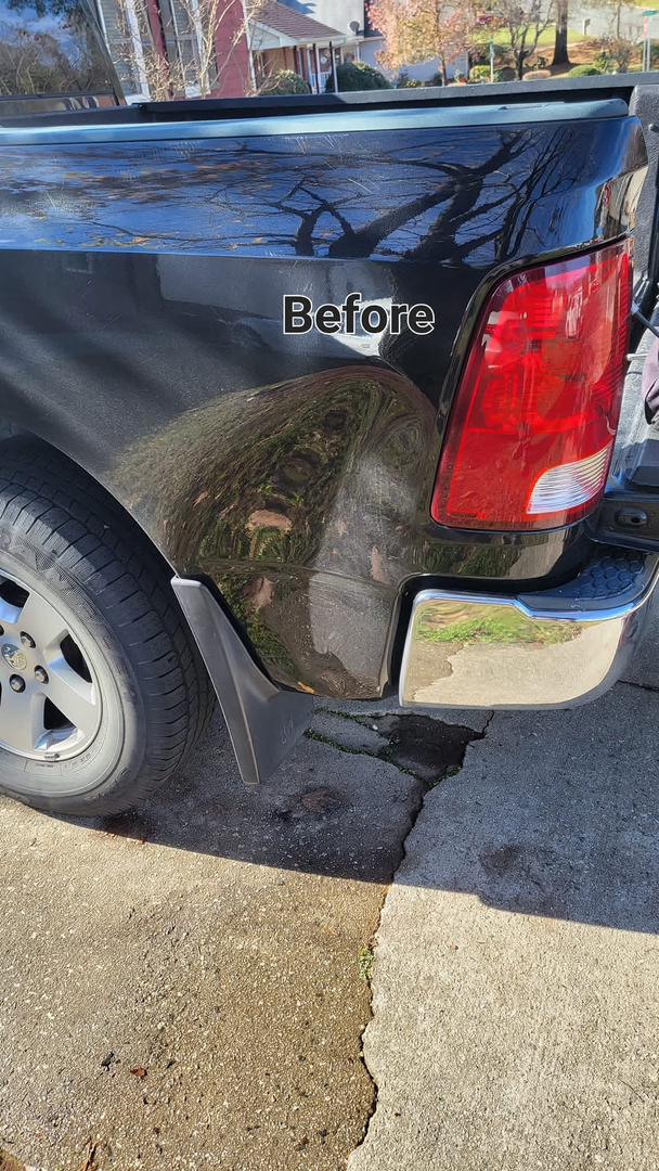 Before: bed-side dent on black pickup truck in Central NC