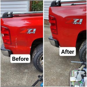 dent repair done on a red truck