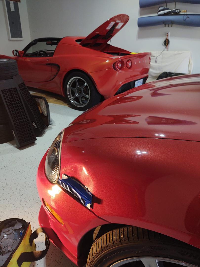 NC paintless dent repair red car before fixing dent